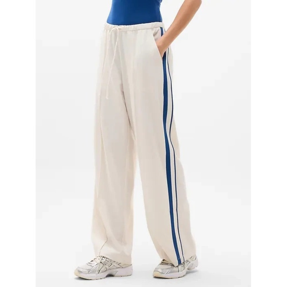 Athleta Cream Track Pants with Blue Side Stripes